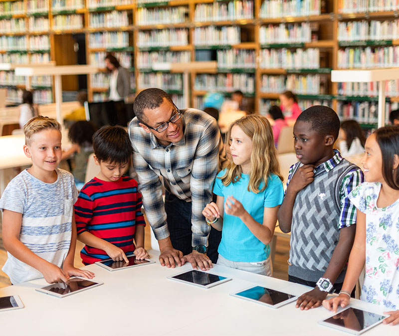 Children in Library with Teacher